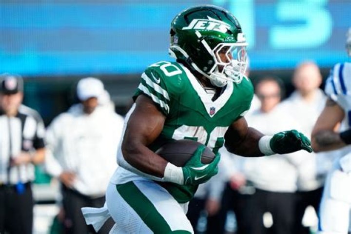 Running Back Breece Hall Makes NFL Draft List- His Father And Mother Proud Of His Career