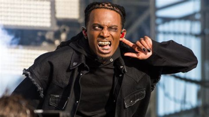 What is Playboi Carti genre? Who is in Playboi Carti’s label?